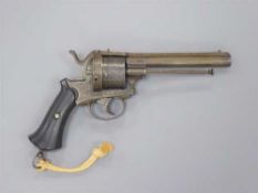 A late 19th century double-action pinfire revolver, the 14cm barrel with ejector rod underneath,