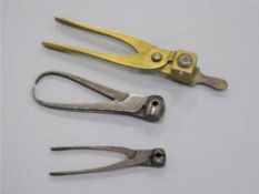 A mid-19th century brass bullet mould for a 'Minie Ball' type bullet, stamped '577', 23.