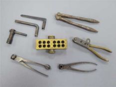 A 19th century brass grain measure stamped 'Maw London',