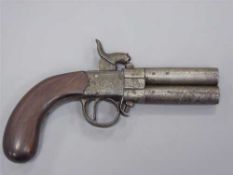 An early 19th century rotating barrel over-under percussion cap pistol, the twin 6.