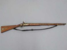 A 19th century percussion cap three-band carbine, with 78cm barrel, walnut stock and steel ramrod.