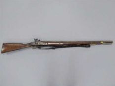 A 19th century percussion cap musket, the lockplate stamped Tower, the 84cm barrel with proof marks,