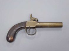 An early 19th century percussion cap pocket pistol, the 7cm screw off barrel with proof marks,
