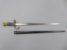 A French Gras bayonet with 52cm blade dated 1874, in steel scabbard.
