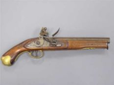 An early 19th century Tower flintlock pistol, with 23cm barrel, steel ramrod and walnut stock.