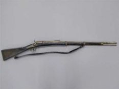 A 19th century Werndl rolling block rifle, with 81cm steel barrel, steel ramrod and walnut stock.