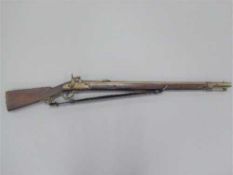 A 19th century continental percussion cap musket, with 82cm barrel, walnut stock and steel ramrod.