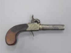 An early 19th century percussion cap pocket pistol, the lock signed H. Nock, London, with a 6.