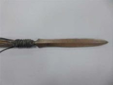 A 19th century African spear head, upon a later haft, length 176cm.