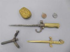 Militaria to include a French Lebel spike bayonet, a trench art letter knife,