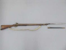 A Victorian percussion cap Enfield two-band musket, with 80cm barrel, walnut stock, sling,
