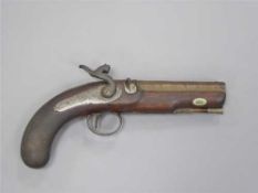 An early 19th century percussion cap overcoat pistol, with 12.