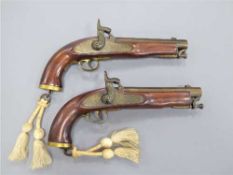 A pair of mid-19th century Indian percussion cap pistols, each with lockplate stamped Tower 1858,