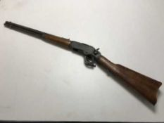 A replica lever action rifle