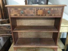 An inlaid mahogany two drawer bookcase