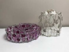 Two metal light fittings one with pink drops