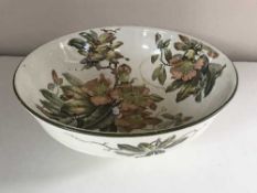 An antique Wedgwood bowl decorated with flowers