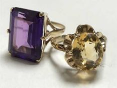 Two 9ct gold dress rings set with citrine and amethyst.