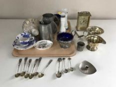 A tray of pewter tankards, continental silver teaspoons,