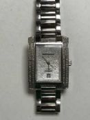A Diamond and Co Gentleman's wrist watch, in original retail box,
