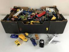 A box of model vehicles, fire truck,