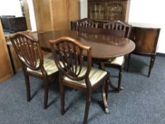 A reproduction twin pedestal dining table,
