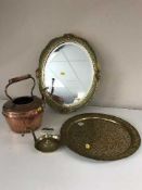 An antique copper kettle together with a brass tray,