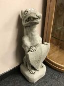 A pair of garden heraldic gargoyles