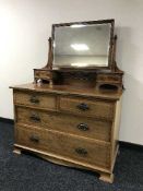 A late Victorian inlaid mahogany dressing chest