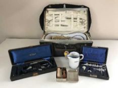 An early twentieth century midwife's case together with two cased diagnostic instruments