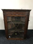 A late Victorian hanging corner cupboard