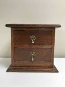 A mahogany two drawer chest