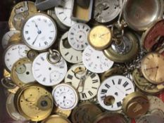 A box containing a large quantity of watch movements