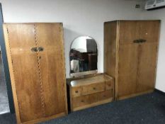 An early 20th century oak three piece bedroom suite