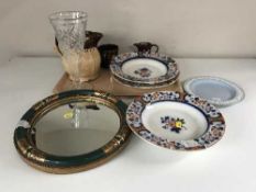 A gilded circular mirror together with a tray of antique plates and copper lustre etc