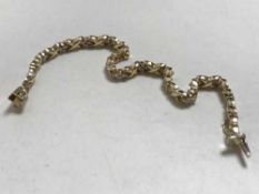 An 18ct gold bracelet set with thirty-six diamonds approximately 1ct, 14.95g.