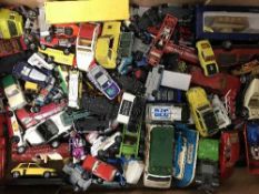 A box of die cast model vehicles