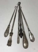 Six Victorian and Edwardian silver handled button hooks