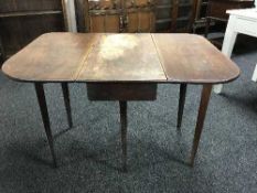 A Georgian mahogany flap sided table