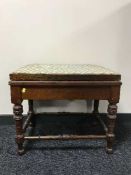 A Victorian mahogany piano stool