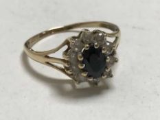 A dress ring upon yellow metal shank