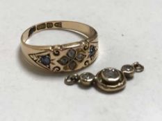 An 15ct gold sapphire and diamond ring and part diamond pendant
