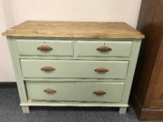 An Edwardian painted pine four drawer chest
