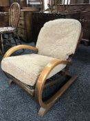 A 1920s sprung rocking chair