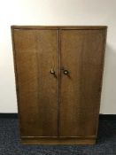 An oak gentleman's wardrobe