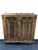 A walnut china cabinet