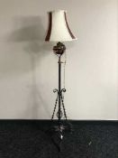 An Edwardian metal and copper floor lamp (converted)