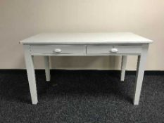 An Edwardian six drawer table