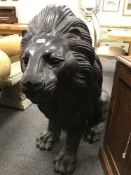 A pair of bronze lion figures