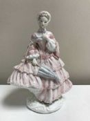 A Royal Worcester figure - Walking our dresses of the 19th century - The Crinolean